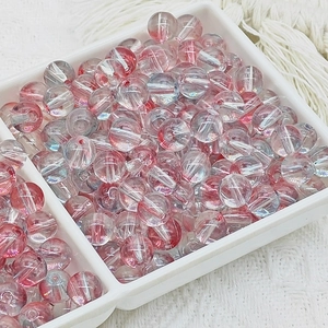 Détails de perles rondes en verre transparent avec motifs rouges pour création de bijoux
