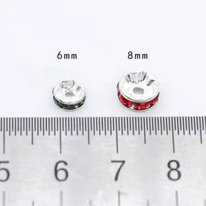 Comparison of 6mm and 8mm silver plated rondelle beads with red and green rhinestones