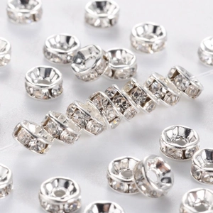 Macro detail of silver rhinestone spacer beads for DIY jewelry making and bracelets