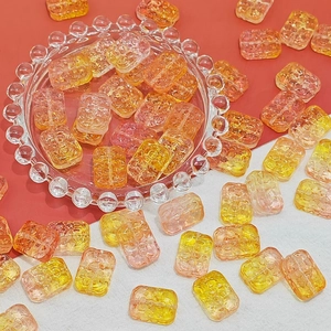 Macro detail of textured gradient glass flower beads for DIY jewelry and necklaces