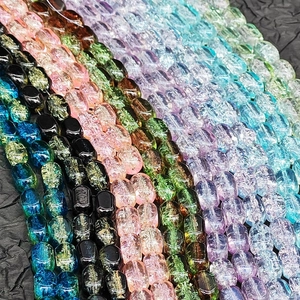 Close-up of 6x10mm ice-cracked rectangle glass beads in vibrant colors for DIY jewelry