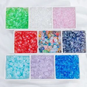 Mix of 8-10mm sparkling gradient glass crystal beads in a grid tray for DIY jewelry making