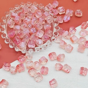 Macro detail of gradient pink lion dance beads for DIY jewelry and hairpins