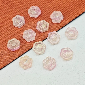 Détail de perles de tournesol en verre de 14mm rose translucide pour bijoux DIY