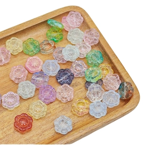 Perles de verre tournesol 14mm colorées pour bijoux DIY dans un plateau en bois