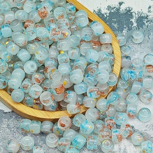Perle a barilotto in vetro azzurro 6x8mm con foglia d'oro per braccialetti fai-da-te