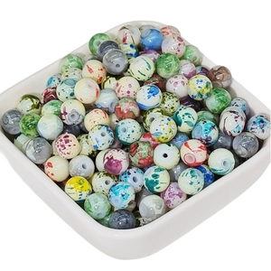 Perline di ceramica colorate con effetto schizzi di vernice per creazione di gioielli
