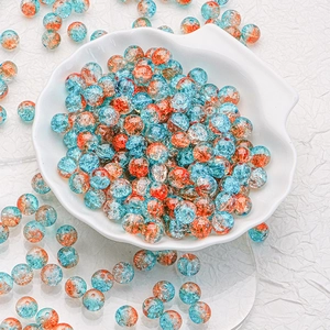 Blue and orange 10mm cracked glass beads for DIY jewelry making in a shell tray