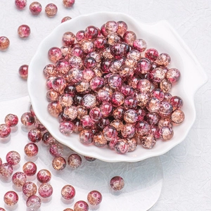 Detailed view of 10mm pink floral crackle glass beads for DIY jewelry making