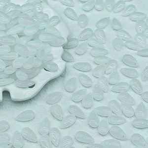 Macro shot of 8x14mm translucent white waterdrop glass beads with top-drilled holes