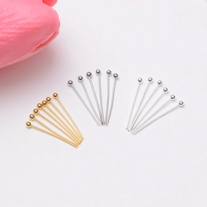 Selection of 14k gold-filled ball pins in gold, silver, and platinum finishes for jewelry making