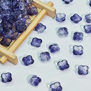 Close-up of 10mm purple flower glass beads for DIY traditional hairpins and jewelry