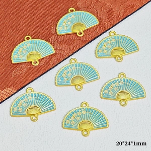 Detail of 20x24mm gold plum blossom fan pendants for DIY jewelry making accessories