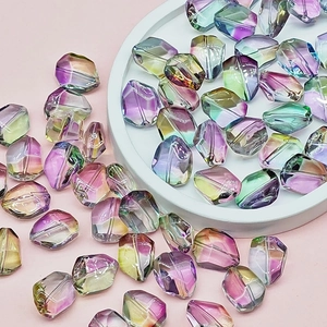 Macro shot of faceted iridescent gradient glass beads for DIY jewelry making