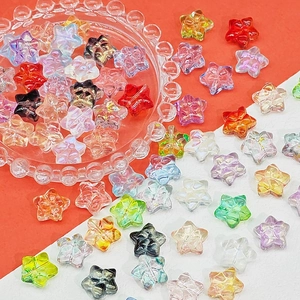 Close-up of colorful pentagram star beads for jewelry making in various vibrant colors
