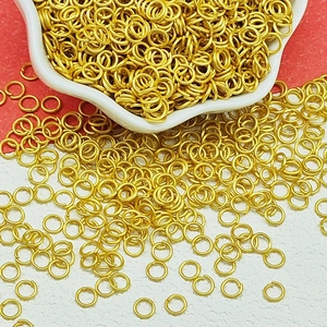Golden open jump rings for DIY jewelry making, connecting necklaces and bracelets