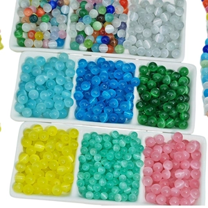 Colorful cat eye glass beads in assorted round shapes for DIY jewelry making and bracelets