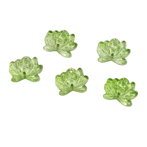 Translucent green glass lotus flower charms for DIY jewelry making and beaded necklaces