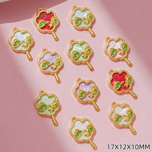 Detail view of fan-shaped enamel charms with landscape patterns in five colors