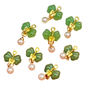 Green clover pendants with golden bows and white pearls for DIY jewelry making