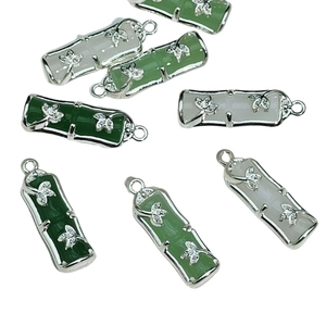 Bamboo style pendant in green and white faux jade with silver leaf floral accents