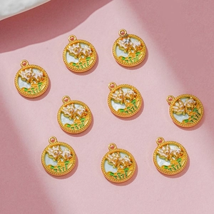 Set of 10 gold lotus flower charms with white enamel and green leaves for DIY jewelry making