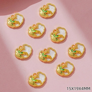 Set of 9 colorful enamel corn charms with gold frame and 15x19x4mm dimensions