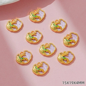 Detailed view of nine gold bamboo ruyi lock charms with purple and green accents