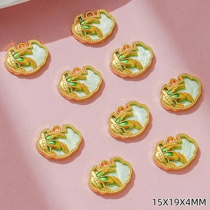 Detailed view of corn-shaped alloy pendants with green enamel and size 15x19x4mm