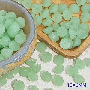 Macro shot of 10x6mm light green lotus seed pod beads for DIY jewelry making
