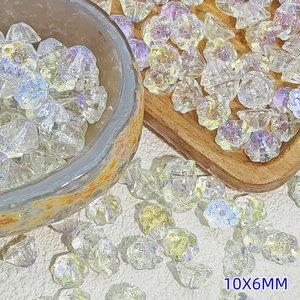 Macro shot of 10x6mm iridescent lotus beads for DIY jewelry and hair accessories
