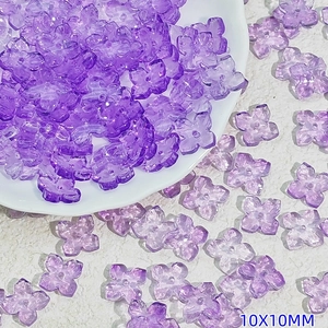 Detailed view of 10mm purple transparent Czech glass flower beads for DIY jewelry making