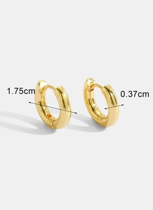 Close-up of gold hoop earrings showing 1.75cm diameter and 0.37cm width dimensions