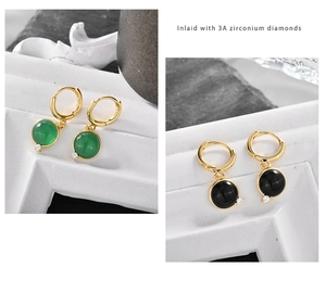 Detail of round natural stone drop earrings with gold plating and 3A zirconium diamonds