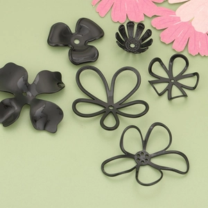 DIY black metal flower charms for jewelry making in solid and hollow filigree styles