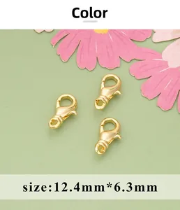 Detailed view of golden lobster clasps sized 12.4mm x 6.3mm for jewelry making