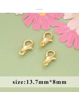 Detailed view of three 13.7mm gold lobster clasps for jewelry making with dimension text