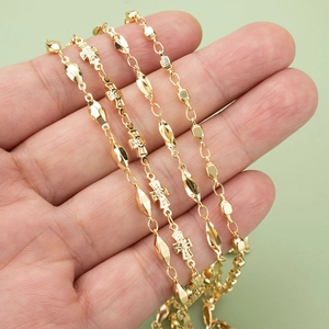 Minimalist 18K gold plated chain necklace featuring small beads and cross charms decoration