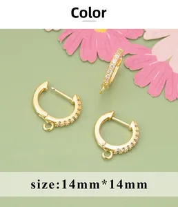 Close-up of 14mm 18K gold plated hoop earrings with micro-pave cubic zirconia stones