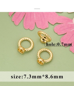 Detail of gold-plated twisted ring jewelry finding with hole size 0.7mm and 8.6mm height
