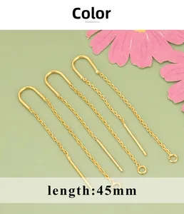 Detail of 45mm gold-plated U-shaped threader earrings with fine chain and small rings
