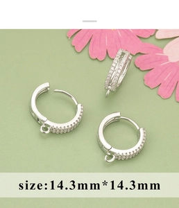 Macro view of 14.3mm silver round hoop earrings with pavé cubic zirconia for DIY jewelry