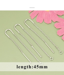 Macro detail of S925 sterling silver 45mm long chain earrings with U-shaped hooks