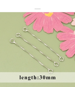 Detail view of 30mm twisted metal link chains with double loops for DIY earring making