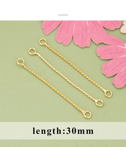 Detailed view of 30mm gold-plated twisted bar connectors for DIY jewelry making