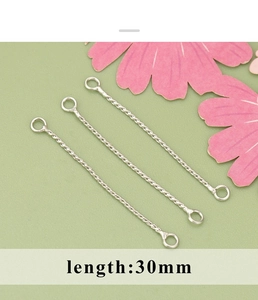 Detailed view of 30mm silver twisted metal jewelry connectors for DIY earrings making