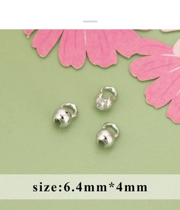 Detailansicht der silbernen Metall-Faltklemmen in Knospenform mit Größe 6,4mm x 4mm