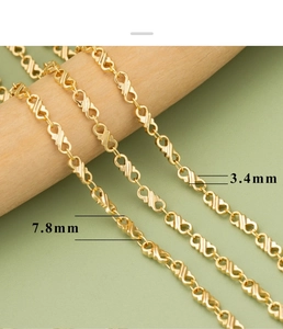 Detail shot of 18k gold plated infinity link chain measuring 3.4mm width and 7.8mm length