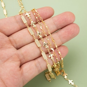 Handheld view of four 18k gold plated geometric chain designs for DIY necklaces