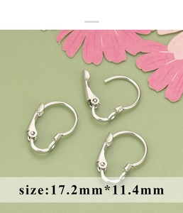 Macro shot of silver lever-back earring findings with dimensions 17.2mm by 11.4mm